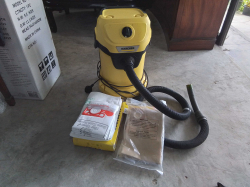 A Karcher Vacuum Cleaner with accessories.