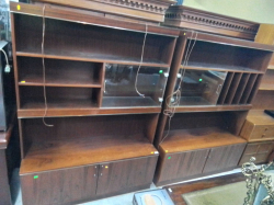 A Pair of Swedish Mid Century Rosewood wall Units(67). D.42 W.125 H.170 Cm.