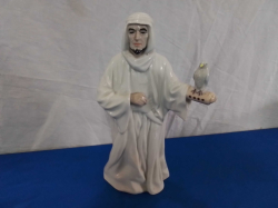 An Unusual Royal Doulton Reflections Figure of an Arab Holding A Falcon. W.15 H.25 Cm.