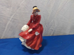 A Royal Doulton Figure in Winter Clother 
