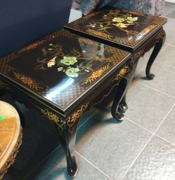 A beautiful pair of of Chinese lacquered hardwood tables  hand decorated with birds and colored  Ivory style decoration Standing on decorative cabriole legs. W.53 H.51 Cm.