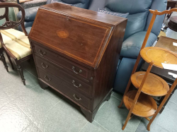 A good looking mahogany Edwardian C,1905 inlaid Bureau desk with original handles and working key standing on original bracketed feet. W.76 D.40 H.93 Cm.