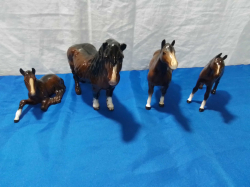 4 Lovely Figures of Horses Possibly  Beswick. ( Large one Ear broken)