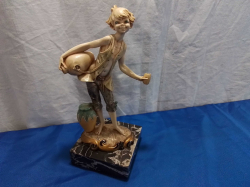 A Large Figure on a Base of a Young Man. W.10 H.24 Cm.