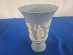 A Wedgwood blue Jasperware Trumpet vase. W.13 H.20 Cm. (A bit broken at Rim)
