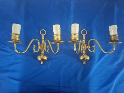 A Pair of brass wall sconces.W. 25 H.20 Cm.