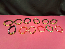 12 Gold Plated Feng Shui Bracelets. 