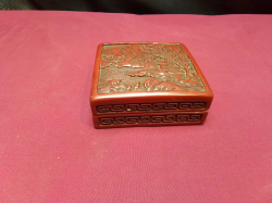A Chinese Cinnabar Laquer square trinket box. W.9 H.4 Cm.