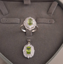Beautiful  green Peridot ring (size 53) and  pendant in 92.5 sterling silver. 