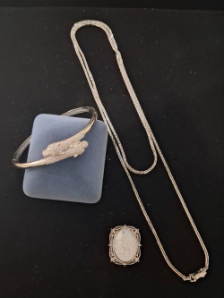 Mixed fashion jewelry silver tone.