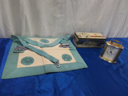 Small Clock, Old Tin and Masons Apron.