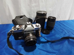 A Good Quality German Camera And Lens 