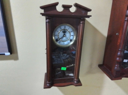 A Pretty 8 Day Striking Wall Clock. D.13 W.13 H.47 Cm.