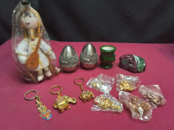 A Job Lot of Pewter Salt Paper, 8 Key Rings, Small Thai Local Doll and 2 other items.