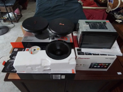 A Pioneer Car Digital Music System with 4 JBL Door Speakers set.