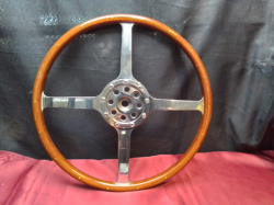 A Lovely Wooden Laminated Ships Wheel with Stainless Steel Center Boss. W.40 Cm.