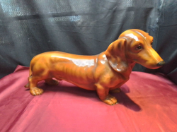 Adorable Dachsund Dog Ceramic figurine (stamped Italy). W.56 H.28 Cm.