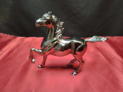 A Silver plated horse.