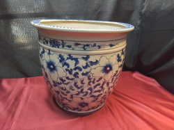 A large blue and white plant pot.W.35 H.33 Cm. 