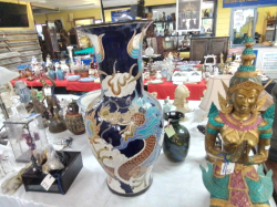 A  large Vietnamese Temple Altar Vases (Blue Dragon motif on black ground). 30 inches high. Online retail price 28,000 baht each.