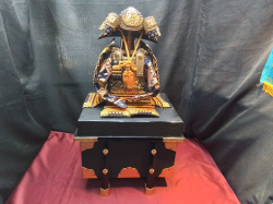 A large samurai warrior set in wooden box W.41D.34 H.34Cm. 