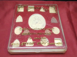 Boxed display set of 15 Somjet Doh  amulets. 17x22 Cm.