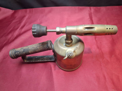 An antique Solid brass French blow lamp 