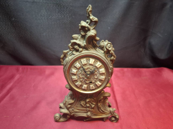 An antique Mantle clock