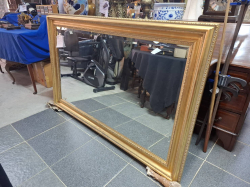 A Large gilted Mirror with bevel glass. 97x150 cm