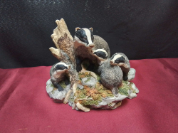 A Hand Made Border Fine Arts Figure of A Fimily of Badgers. W.16 H.12 Cm.