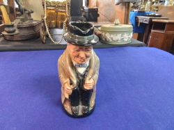 A Small Royal Doulton Toby Jug of Winston Churchill.