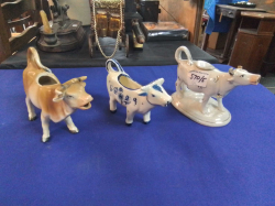 3 Old Cow Tureens 1 with lid.( 2 English,1 Dutch)