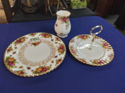An Old Country Rose 1980 Calendar Plate W.26 Cm., A Cake Stand W.20 Cm. and Vase H.13 Cm.