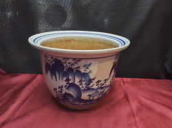 A blue and white plant pot. W.28 H.20 Cm. 