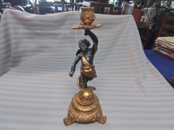 An Unusual Gilt Candlestick. W.15 H.38 Cm.