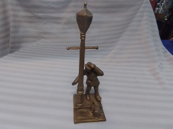A Brasx Model of A Lamp Lighter. W.9 H.28 Cm.
