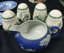 A  rare 19th century dark blue C,1880 Wedgwood jasperware creamer milk jug. A  rare 19th century dark blue C,1880 Wedgwood jasperware creamer milk jug With a set of 4 porcelain Ivy pattern salt and pepper set With a set of 4 porcelain Ivy pattern salt and
