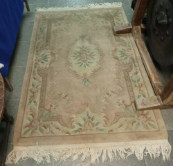 An antique ambition style thick pile rug very good quality  and lovely to walk on 125x192 Cm.