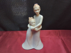 A vintage ROYAL WORCESTER figurine 