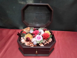 A Hexagonal Flower Musical Jewelry Box, with pull out drawer. W.17 L.23 H.13 Cm.