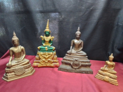 4 Sitting Buddha Statues.