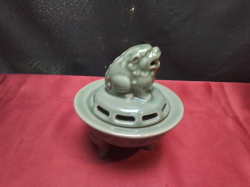 Chinese celadon incense burner with foo dog. W.11 H.13 Cm.
