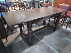 A Lovely Solid Oak Extending Dining Table with 4 Carved Legs Joined by A H Shaped Statency.(95). W.76 L.182 H.75Cm.