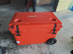 A Large Orange TSI Cooler Box 75 Liter 