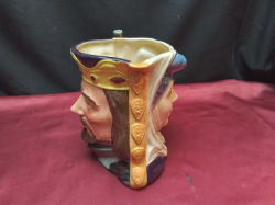 A Large Old Doulton Tw8n Faced Character Jug of King Arthur and Guinevere in Limited Edition No.50 .