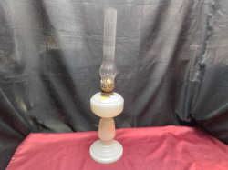 An Opaque White Glass Oil Lamp.   W.14 H.57 Cm.