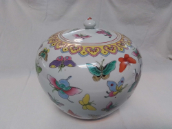 A Large Chinese Gingar Jar Decorated with Colorful Butterfly. W.23 H.22 Cm.