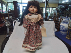 A Large Porcelain Head Doll on Stand 'Rosa' W.60 H.20 Cm.