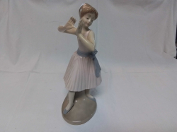 A LLADRO Style Figure of a Young Girl. W.11 H.25 Cm.