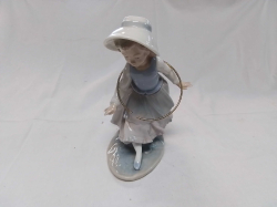 A NAO by LLADRO Figure of A Young Girl with a Hula Hoop. W.11 H.19 Cm.